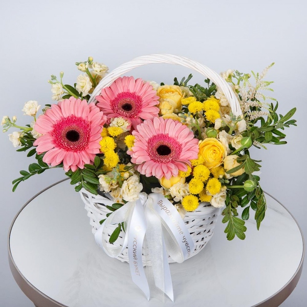 Gerbera pink - 5, Spray rose: yellow, orange 50 cm - 1, White Matthiola - 3, Santini Yellow Spray Chrysanthemum - 5, Small Basket, Oasis, Small Basket, Pistachio, Ribbon, Astilbe