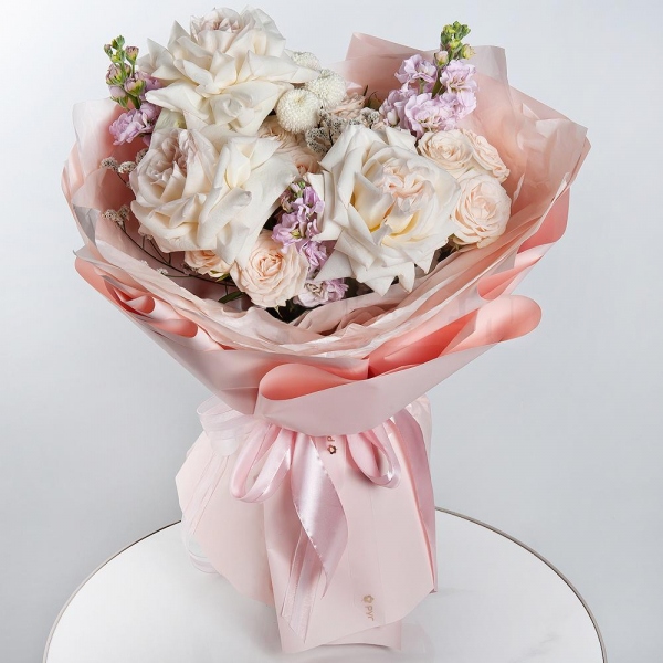 Peony style roses - 7, Peony sprayrose - 3, Matthiola Lilac - 3, Newton White Spray Chrysanthemum - 2, Limonium (1 pc.), Wrapping Paper