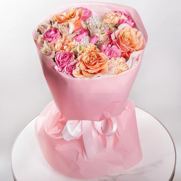 Pink-orange rose Phoenix 50 cm - 3, Bright pink spray rose mix, 50 cm - 3, Baltica White Spray Chrysanthemum - 1, Carnation white, cream - 7, Alstromeria white, soft pink - 6, Wrapping Paper
