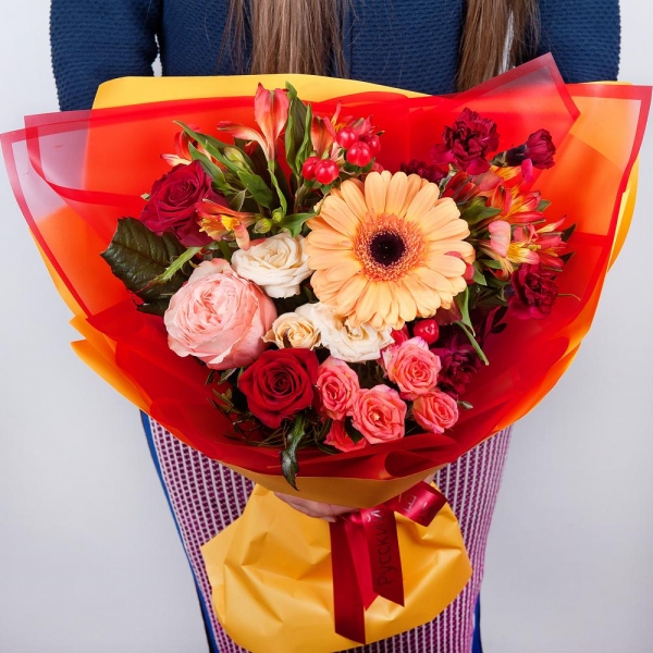 Gerbera daisies - 1, Spray rose: white, cream, light pink 50 cm - 1, Peony rose Kahala 50 cm - 1, Red rose 50 cm - 3, Carnation spray - 2, Alstromeria Yellow, Orange - 3, Bright pink spray rose mix, 50 cm - 2, Hypericum, Wrapping Paper