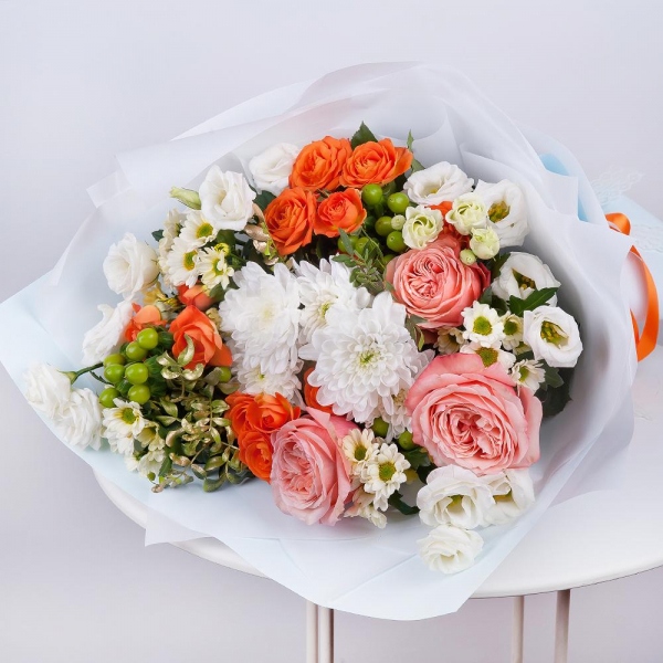 Baltica White Spray Chrysanthemum - 2, Santini White Spray Chrysanthemum - 4, Spray rose: yellow, orange 50 cm - 3, Peony rose Kahala 50 cm - 4, lisianthus - 2, Hypericum, Pistachio, Wrapping Paper