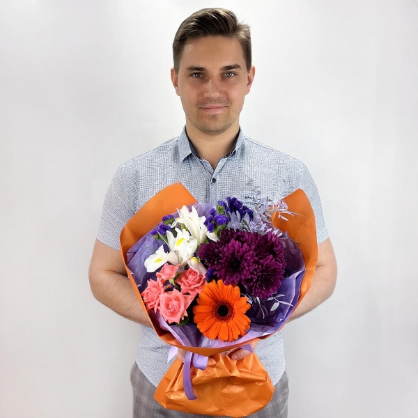 Gerbera daisies - 2, White iris - 4, Bright pink spray rose mix, 50 cm - 2, Baltica Pink Spray Chrysanthemum - 3, Blue Statice, Wrapping Paper, Pistachio