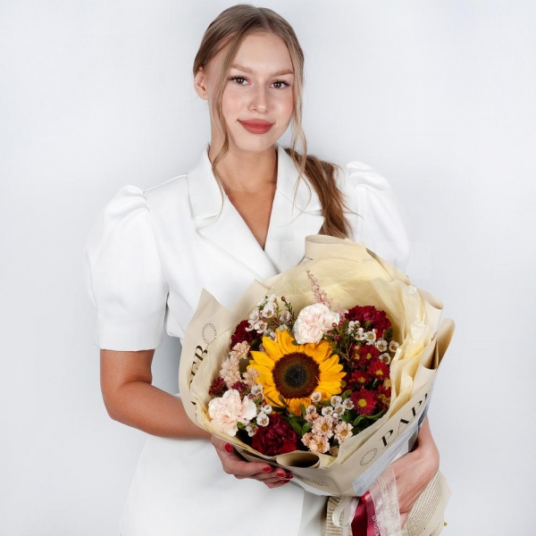 Sunflower - 1, Daisy poms Santini pink, purple - 5, Carnation red - 4, Carnation white, cream - 3, Waxflower (1 pc.), Astilbe, Pistachio, Wrapping Paper