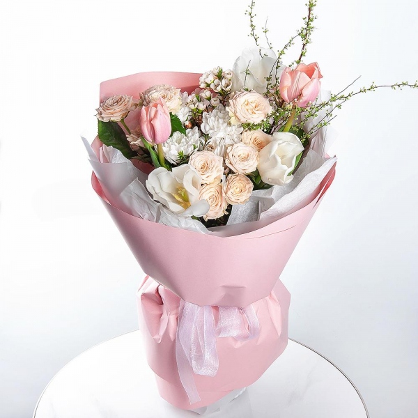 Tulip white - 5, Spray rose: white, cream, light pink 50 cm - 4, Baltica White Spray Chrysanthemum - 1, Pink tulip - 4, Artificial branch, Waxflower (1 pc.), Wrapping Paper